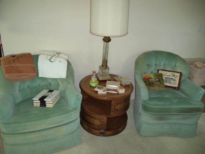 velvet occasional chairs, round table, glass lamp