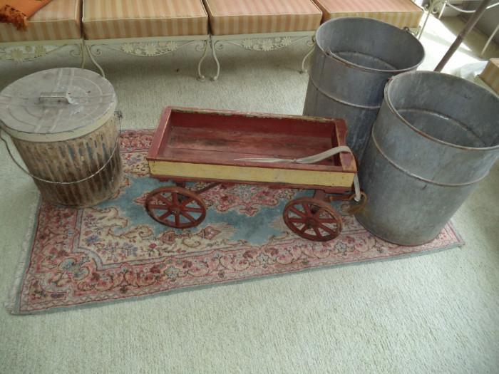 antique wagon, oriental rug, galvanized cans