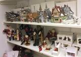 Merry Christmas! Decorations including Santa figurines & lots of Dept. 56 "Heritage Village Collections" buildings & figurines.