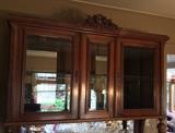 Vitrine top of French sideboard - the doors on either side open, as does the center glass panel. With interior lights.