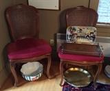 More of French Provincial dining set - shown are 2 of the 6 side chairs. With large Laurie Gates ceramic bowl, rectangular Paris Moulin Rouge platter, antique wooden tray with marquetry seashell & brass rails, round gilt tray