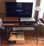 Newer VIZIO 38.5" LED color TV with remote (Model E390-A1), Kenwood KR-4200 stereo receiver with original box, JVC DVD player (XV-N412), JVC 4 head VCR, mod desk lamp with frosted glass shade