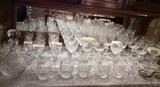 Crystal stemware including Waterford Colleen & Lismore goblets & rocks glasses and Rock Sharpe goblets by Libbey, other etched goblets too.