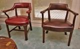 Red leather Councill chair and Hancock and Moore brown leather chair