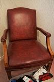 One of two leather arm chairs