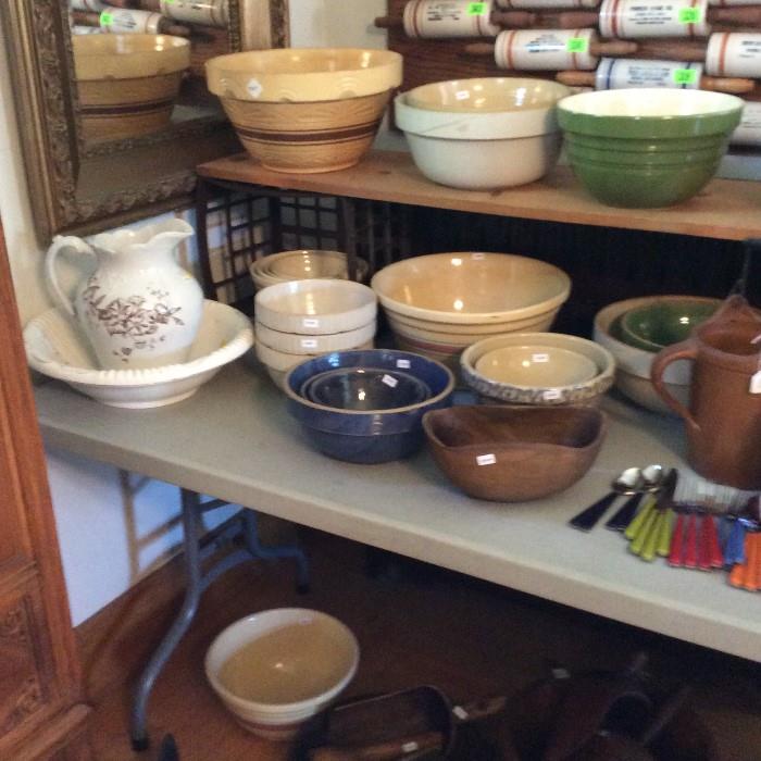 Bowl & pitcher & more crock bowls  (Rolling pins in this picture are going to be sold at public auction on July 30 at Mason City fairgrounds by Fox Auction Co).