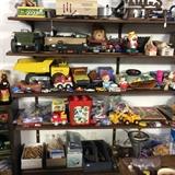 Toys galore from trucks to dolls to Legos, etc. Plus 3 boxes of kids books.