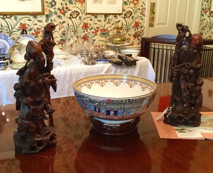 Pair large oriental carvings with Mottahedeh Winterthur Chinese export punch bowl.