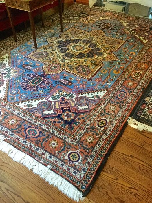 Large hand knotted oriental rug.