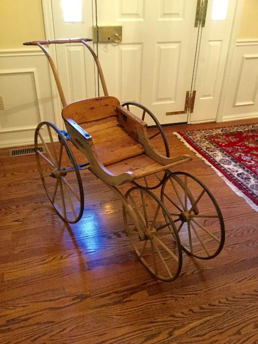 19th c. wooden child's carriage.