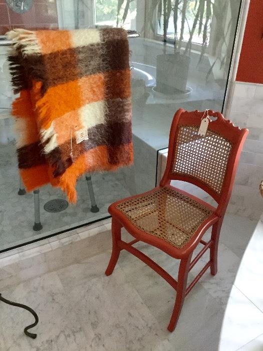 Lacquered chair with Hudson's Bay throw.
