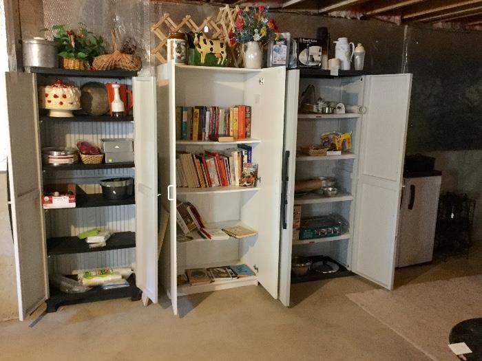 Storage cabinets full of cookbooks and kitchen items