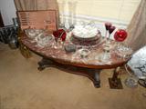 Marble coffee table with crystal serving pieces
