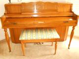 Baldwin upright piano in beautiful condition! Bench included...and sheet music!