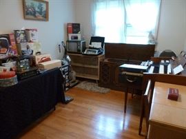 Organ, Stereo cabinet with 8 track player and turn table, organ, sewing machine with cabinet, vacumm, LP's, accordian, Bookcase with Glass sliding doors