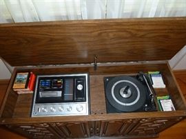 Turntable/eight track/reciever stereo cabinet mid century