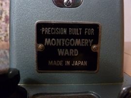 Vintage Montgomery Ward sewing machine and cabinet