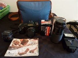 The Canon T70 was a 35mm FD-mount single-lens reflex camera introduced in April 1984 as the second in Canon's T series. The T70 started with the concepts explored in 1983's T50, took them further, and applied them to a more sophisticated camera. While the Program AE-only T50 was intended as a beginner's camera, the T70 gave the photographer a lot more control over the camera's operation while keeping the T-series philosophy of simplicity in control and operation intact