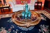 Vintage round gold glass-top coffee table and pottery coffee set