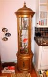 Vintage gold round curio cabinet