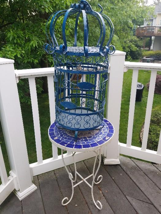 Novelty blue metal birdcage - not shown- two outdoor metal patio table and chair sets