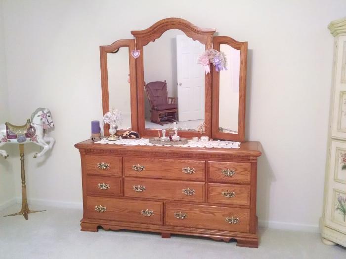 Ladies' bedroom dresser and matching three-panel mirror. Miniature carousel horse.