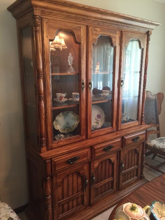 Beautiful Solid Wood China cabinet.  All the doors open and there is a light inside.  Great storage!