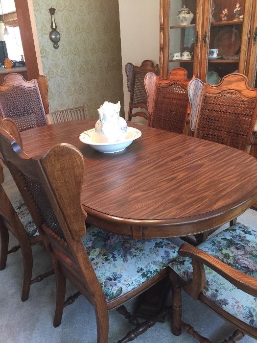 Unique table and 8 chairs.  Has been reupholstered.  SO pretty!