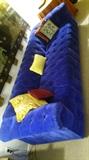 Best In Class. Custom Made Royal Blue Tuffed Velvet Sofa Hardly used in Living Room on Wheels on Casters for easy rolling for easy cleaning vacuuming under thr SOFA! Hurray fast too magnificent to last long. Priced at a small fraction of it's original new cost. Super comfortable!