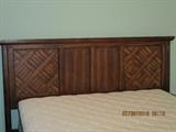 Queen size Bassett headboard with frame, pictured with full mattress and frame, bedroom set