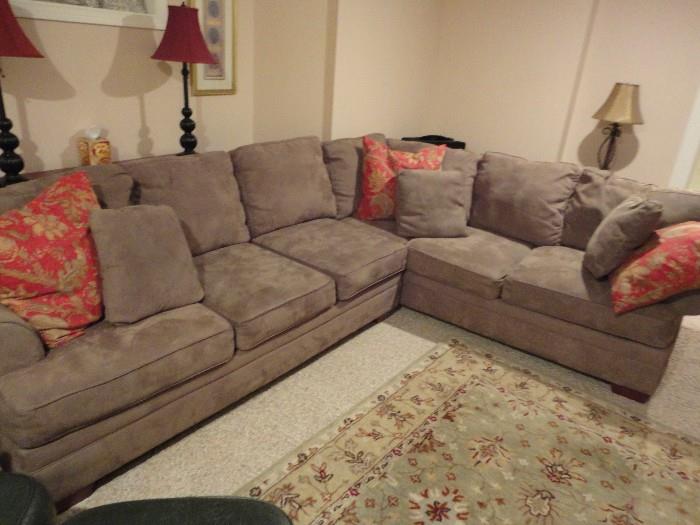 Boston Interiors sectional sofa.  Color: tan.  Fabric: microfiber.