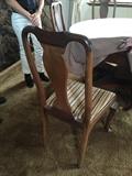 Re-upholstered chairs included in set 