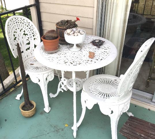 Outdoor Table and Chairs with decorative scroll work