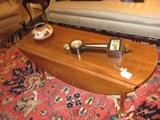 Suter's coffee table, banjo clock and Indian bowl.  Indian Heriz Oriental carpet 9X12.