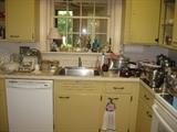 Retro kitchen packed with useful and collectible items.