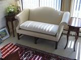 Small loveseat and pair of matching wood side tables
