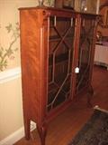 Chinese Chippendale style bookcase/cabinet with glass doors; holds a lot in a narrow space!