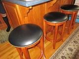 3 bar stools with stud trim