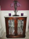 Antique marble top w/glass front and sides, mirrored and display shelf