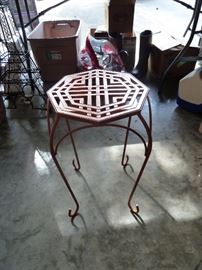 Red metal plant stand