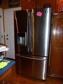 Stainless Steel LG refrigerator 3 door side by side with digital dispenser