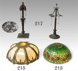 Period Lamp Shades and Bases: 216) Bradley & Hubbard Lamp Base & unsigned base as a lot; 213) Handel “Cherry Blossom”; 215) Filigree Carmel Slag Glass