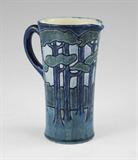 Newcomb College Sara Bloom Levy Pottery Vessel: 1906, Incised wooded glade design. 5” h.