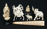 European, Oriental, and African carved ivory figures.