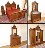 Lot 53: 7 PIECE HIGH VICTORIAN BEDROOM SET: Each piece with matching carved crests, fluted columns and applied decoration. To include pair of twin beds conjoined to create a king size BED using 2 mattresses (Headboard 78'' h. x 74 1/4'' x 4 3/4'', footboard 41 1/2'' h. x 75 1/2'' x 5 3/4''_, marble top vanity with mirror (81'' h. x 39 1/2'' x 20 1/2''), marble top dresser (100'' h. x 52'' x 23 1/2''), armoire (107'' x 86 1/2'' x 24''), pair of marble top night stands (57 1/2'' h. x 19 3/4'' x 15'').
CONDITION: Evidence of prior wood worms, the occasional missing trim piece, please call for condition. Shippers note several of the pieces break down.