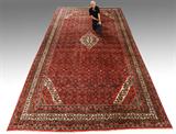 Lot 92: PALACE SIZE NORTHWEST PERSIAN RUG: With a Herati pattern, 23' 10'' x 12' 8''