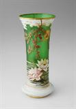 Lot 1145:  MONT JOYE FRENCH ART GLASS VASE: Cameo cut and enameled glass depicting a water lily filled pond under pine boughs, with the sun shining through. Measures 11.5'' tall.
CONDITION: Some slight wear to gold gilt, attribution.