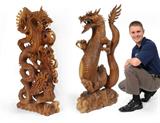 Lot 1071:  CARVED SUAR WOOD SCULPTURE OF COMBATIVE DRAGONS: Exceptional detail with one dragon clenching a mystery ball in it's claw. Actual age unknown. 43 1/2'' tall x 7 1/2'' w x 17 1/2''.
CONDITION: Note at least 2 chips to spine and head.Lot 1072:  LARGE CARVED SUAR WOOD DRAGON SCULPTURE: Upright full body sculpture measuring approx. 46'' tall x 11'' x 23''. Actual age unknown.
CONDITION: Whisker loss and age separations.