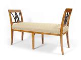 Lot 1005:  KARL JOHAN BIRCHWOOD BIEDERMEIER BENCH: Circa 1820, outswept arms with ebonized carved wood decoration. On 6 legs, recently re-upholstered with a diamond pattern. 30 1/2'' h. x 49 1/2'' x 16 1/2''
CONDITION: Area of repair to one arm.