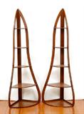 Lot 1026:  PAIR WILLIAM IV MAHOGANY CORNER SHELVES: 5 graduated shelf corner etagere, circa 1830, with shaped supports. 53 3/4'' h. x 19 3/4'' x 12 1/2''.
CONDITION: Wear consistent with age and use, appear to have had 3 feet at some point.